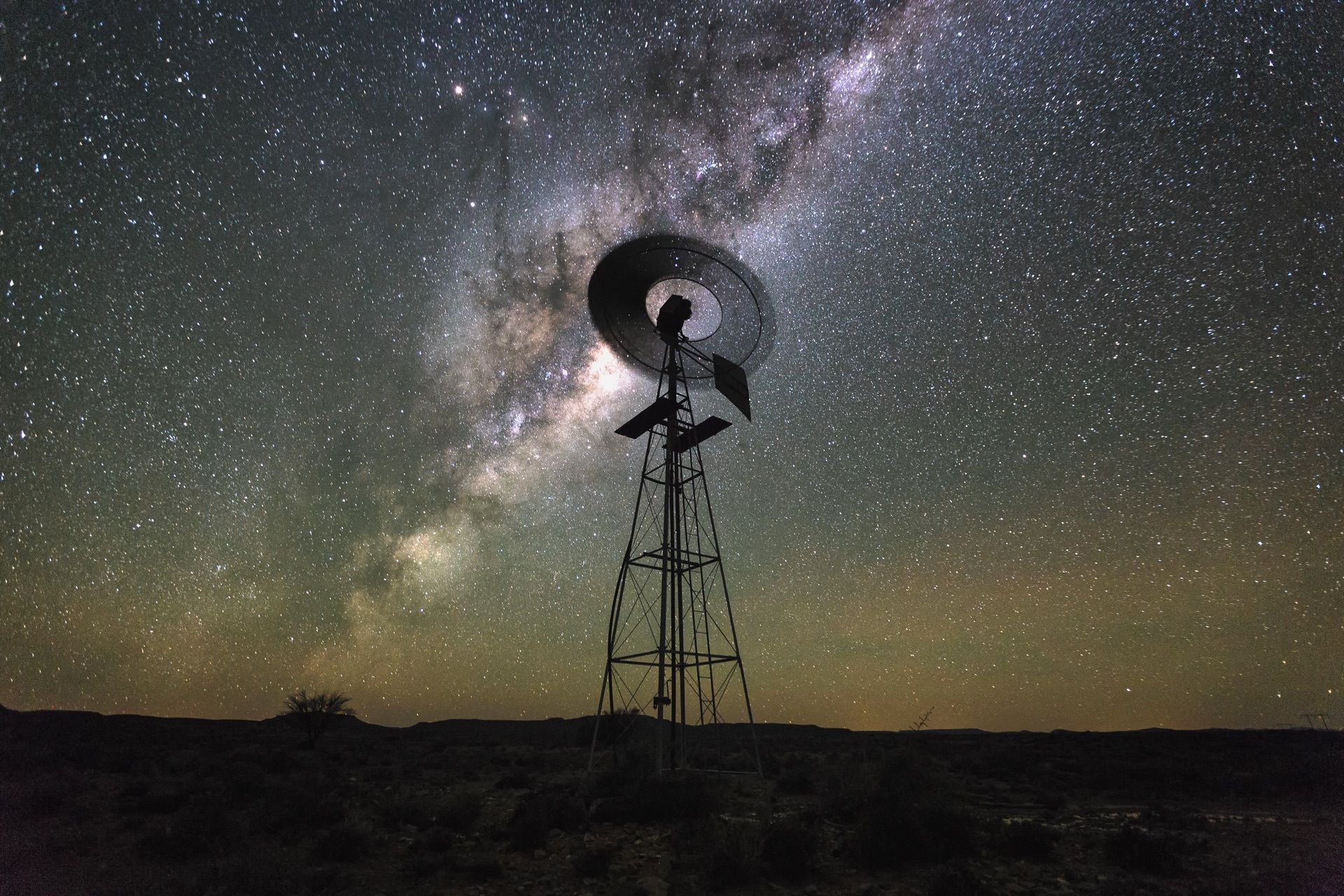 A windmill under the Milky Way in the Karoo night sky